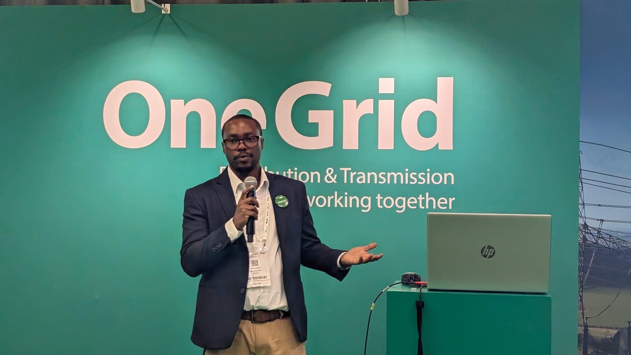 Clifford Ondieki presenting at the OneGrid Pavilion, CIGRE Paris 2026